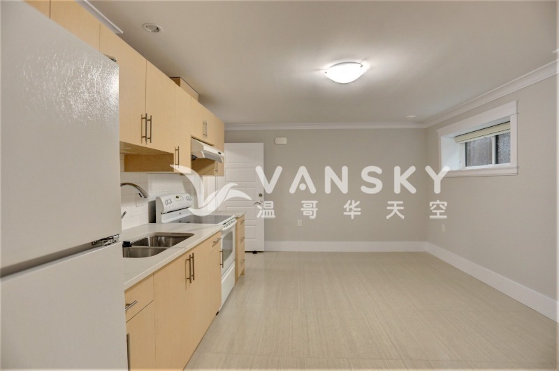 260410100306_2 lower 2bd kitchen living.jpeg